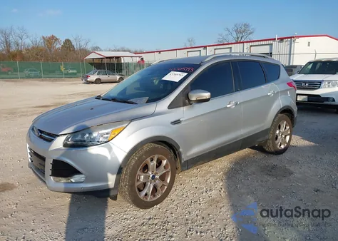 2014 Ford Escape Titanium z USA, uszkodzony, nr VIN 1FMCU0JXXEUC19573